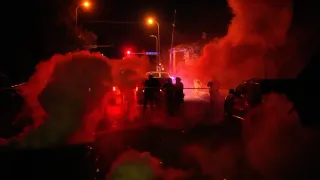 Tear Gas Floods a Minneapolis Family's SUV After They Get Caught Between Protesters and Officers